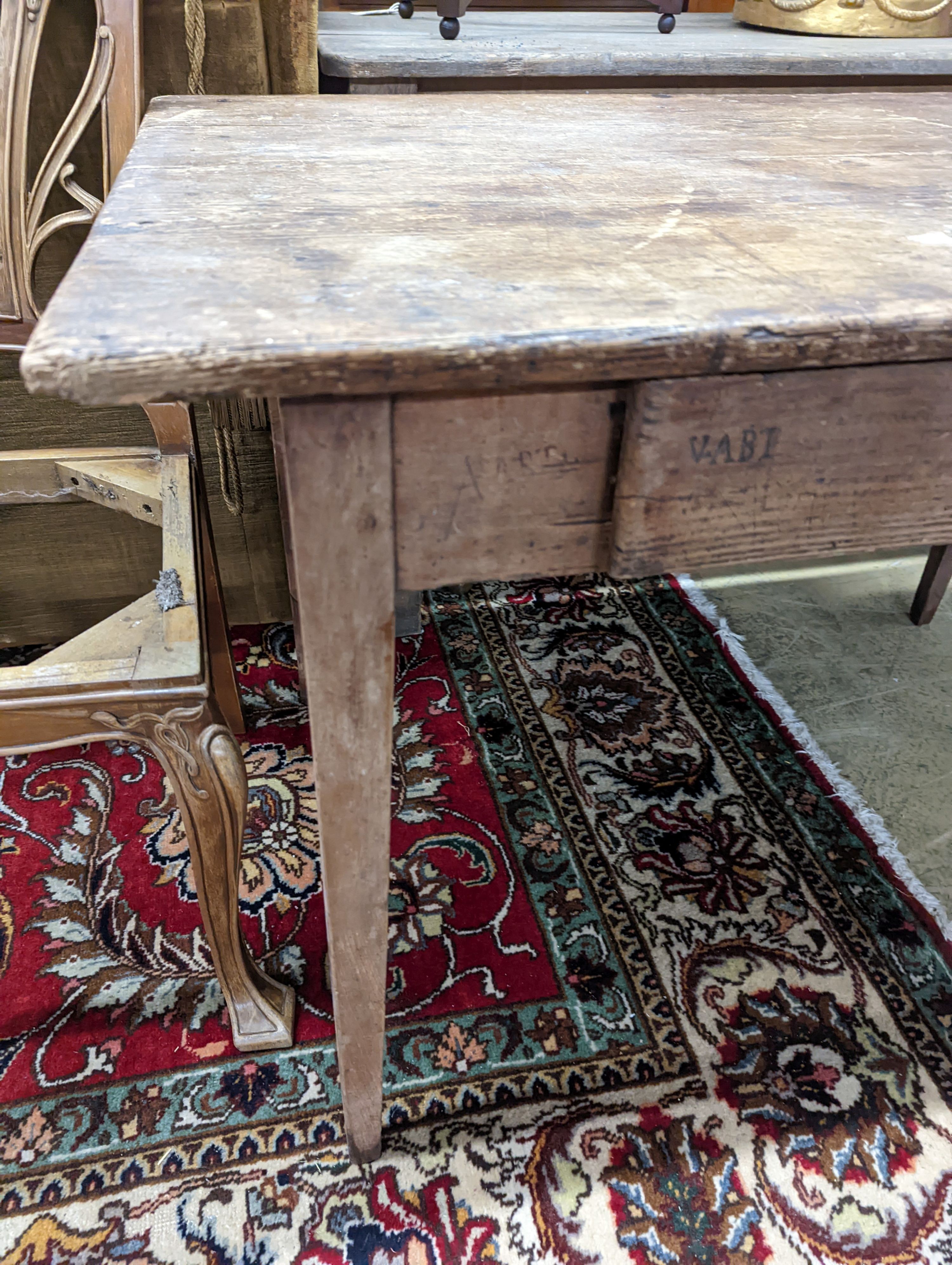 A 19th century French pine farmhouse table. W-120cm, D-74cm, H-74cm.